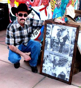 Francisco Beltran posing by cowboy image